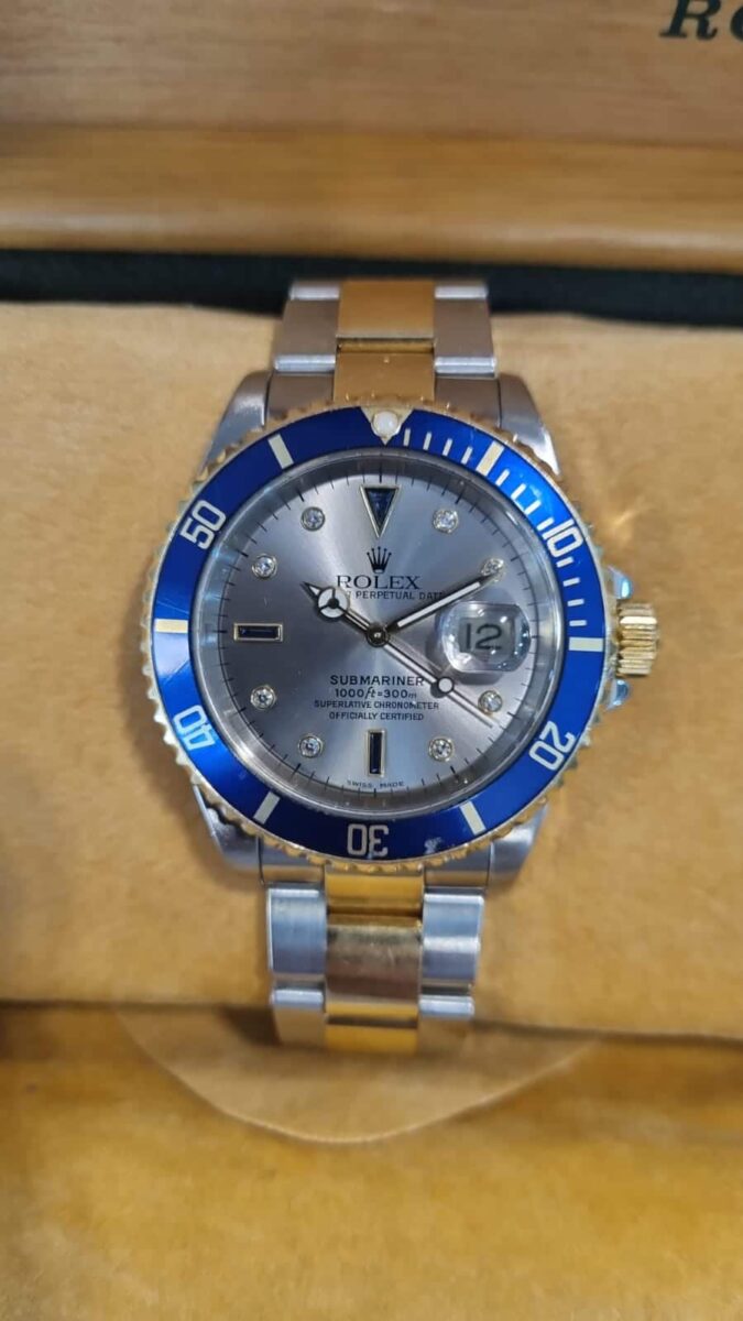 Rolex Submariner Steel and 18k Yellow Gold Grey Serti Diamonds dial | Gothelf A. Watches